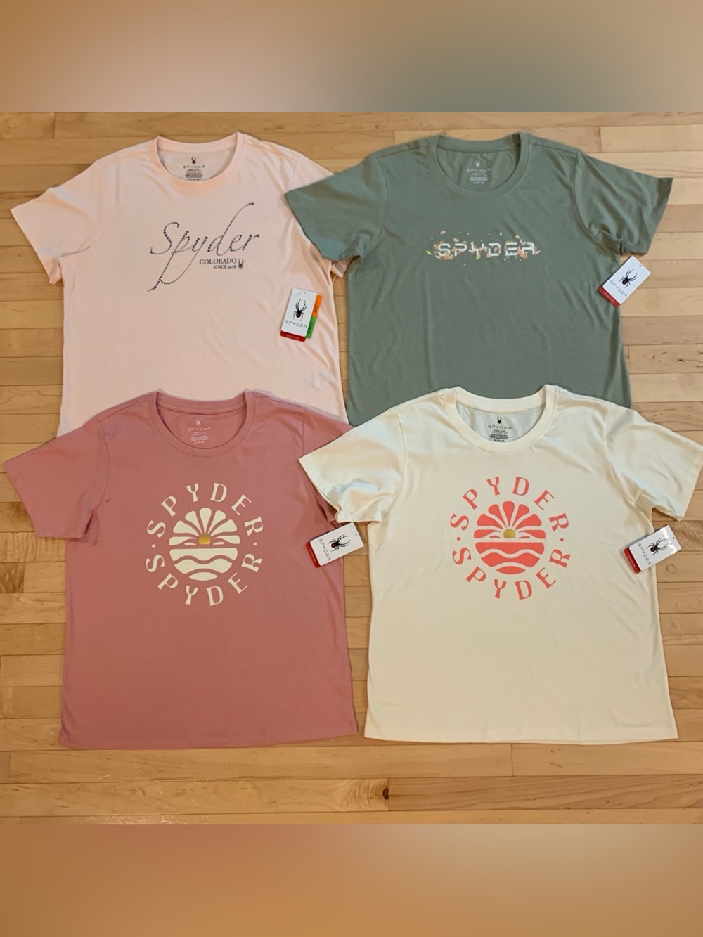 NWT Spyder Women’s Size XL Graphic Tees – Lot of 4 – Peach, Olive, Rose & Pearl